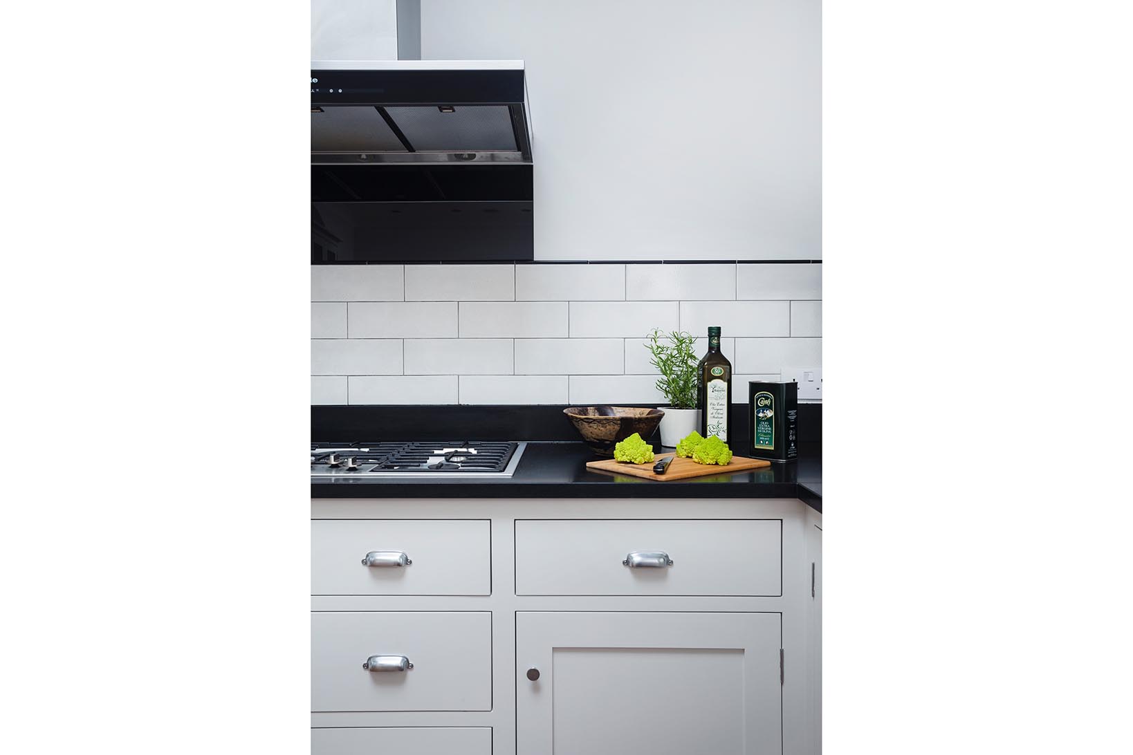 Handmade and bespoke Charlie Kingham kitchen project before image of exposed bricks and carpentry with new windows.