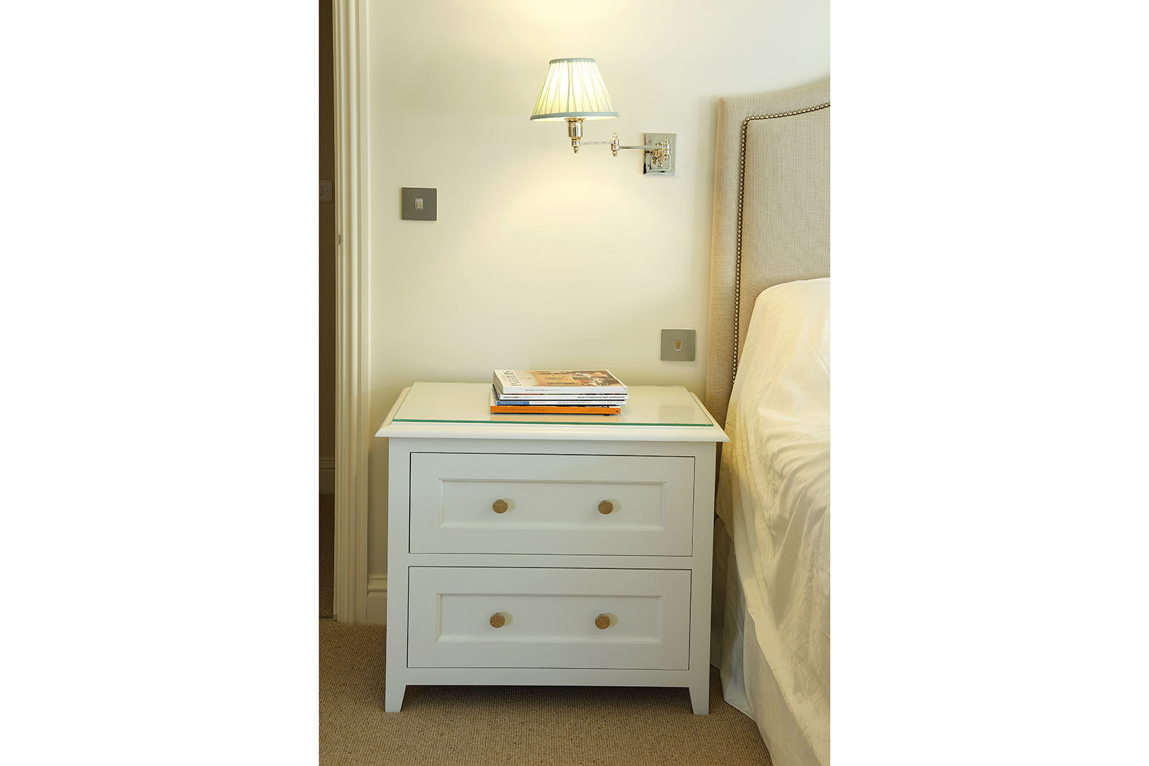 Bespoke shaker style bedside table with two drawers painted in Zoffany Quarter Paris Grey with polished chrome handles.