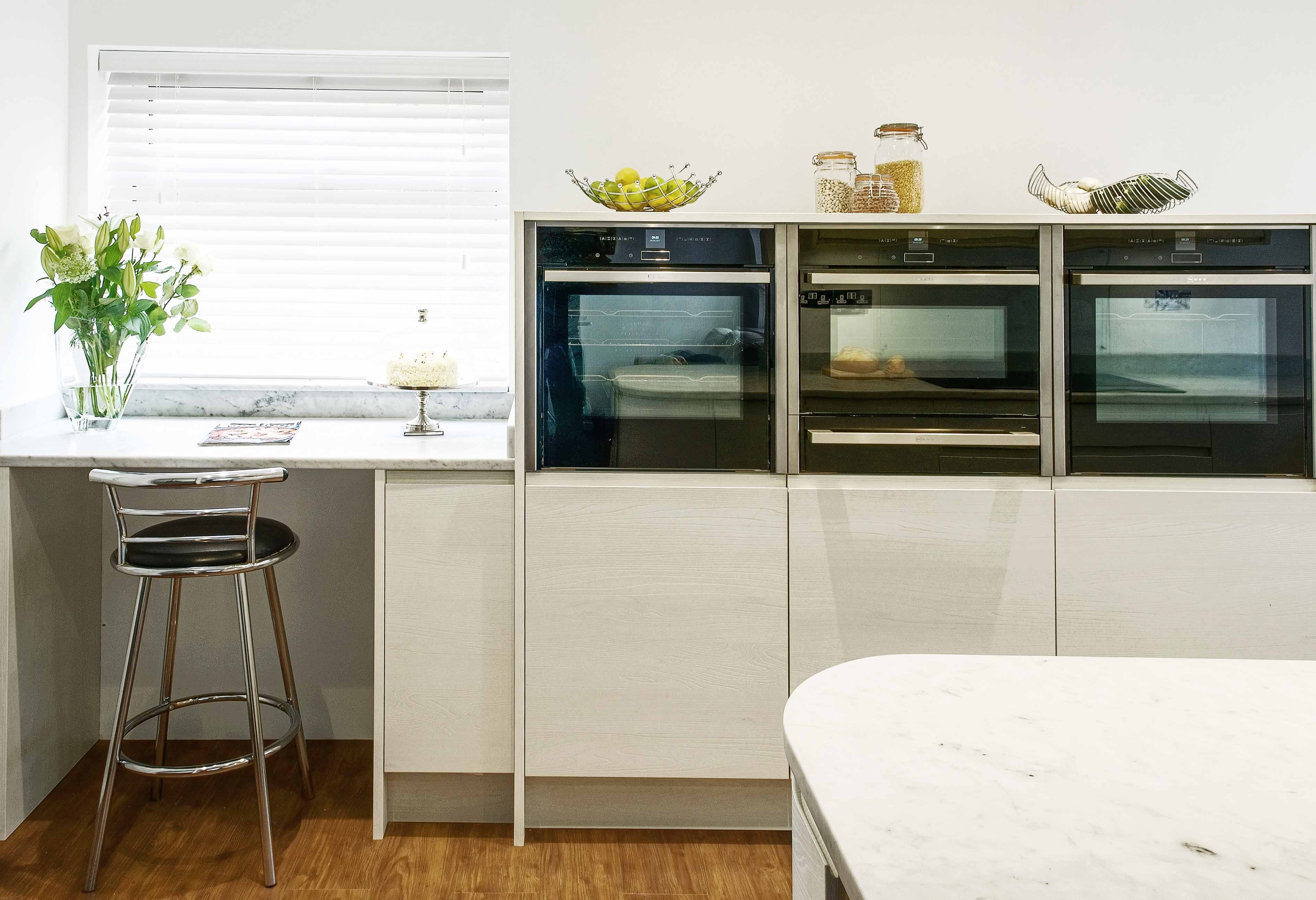 Contemporary modern luxury designer bespoke kitchen neff oven fisher paykel fridge marble quartz granite tops Alton Hampshire