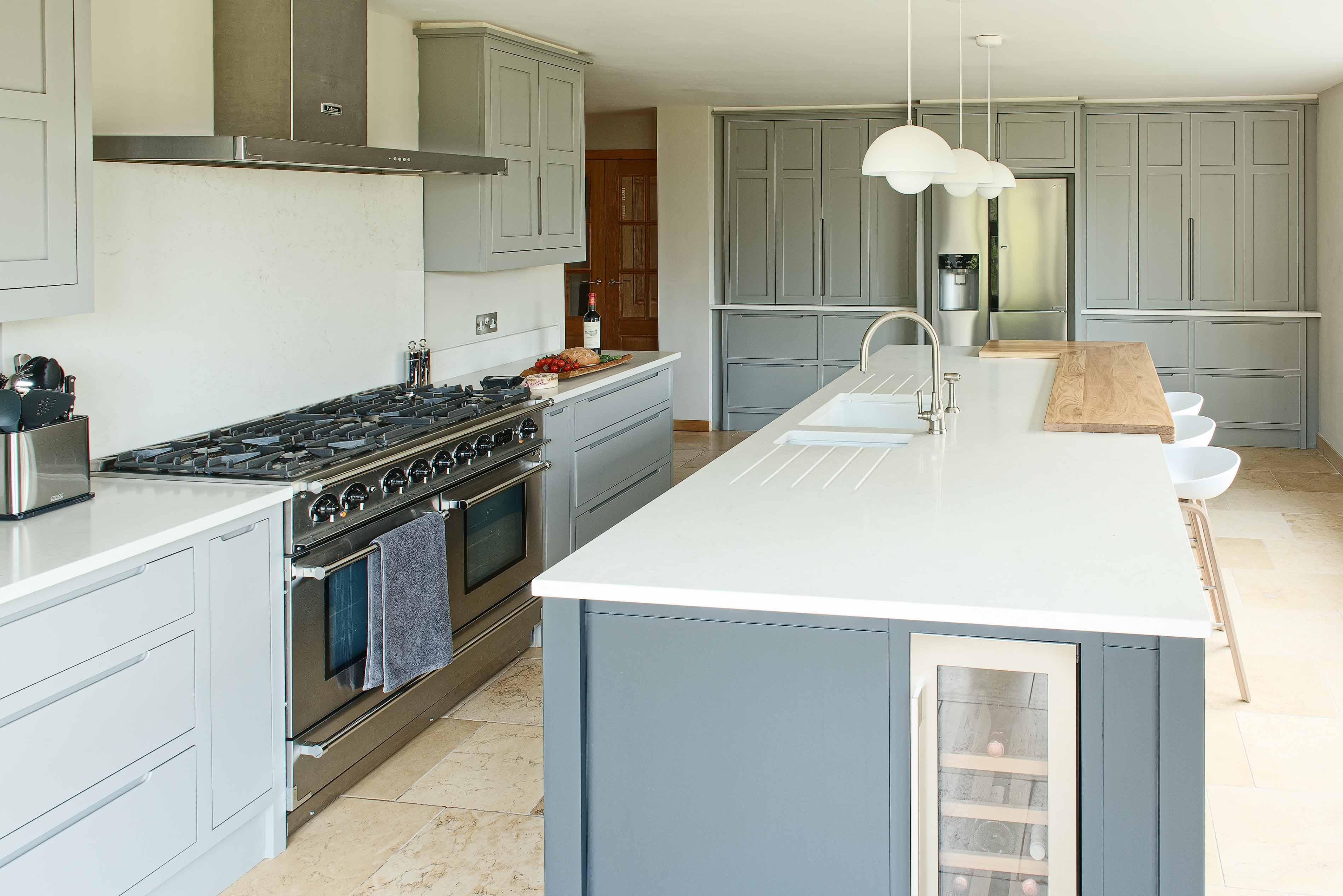 Contemporary modern shaker style bespoke kitchen falcon range cooker perrin and rowe tap sink wine cooler fisher paykel fridge pavilion grey farrow and ball Farnham Hampshire