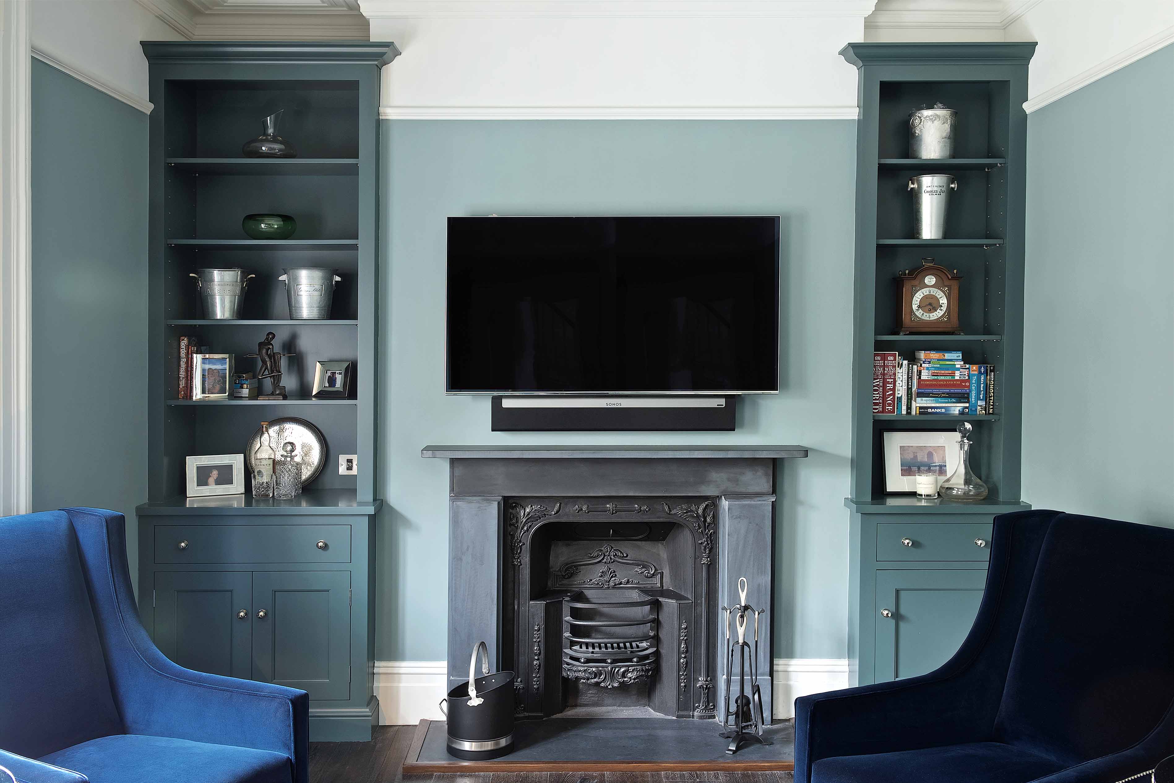 002. Lounge dining room alcove bespoke joinery cabinets library book case hand painted classic farrow and ball near Winchester Hampshire and Surrey