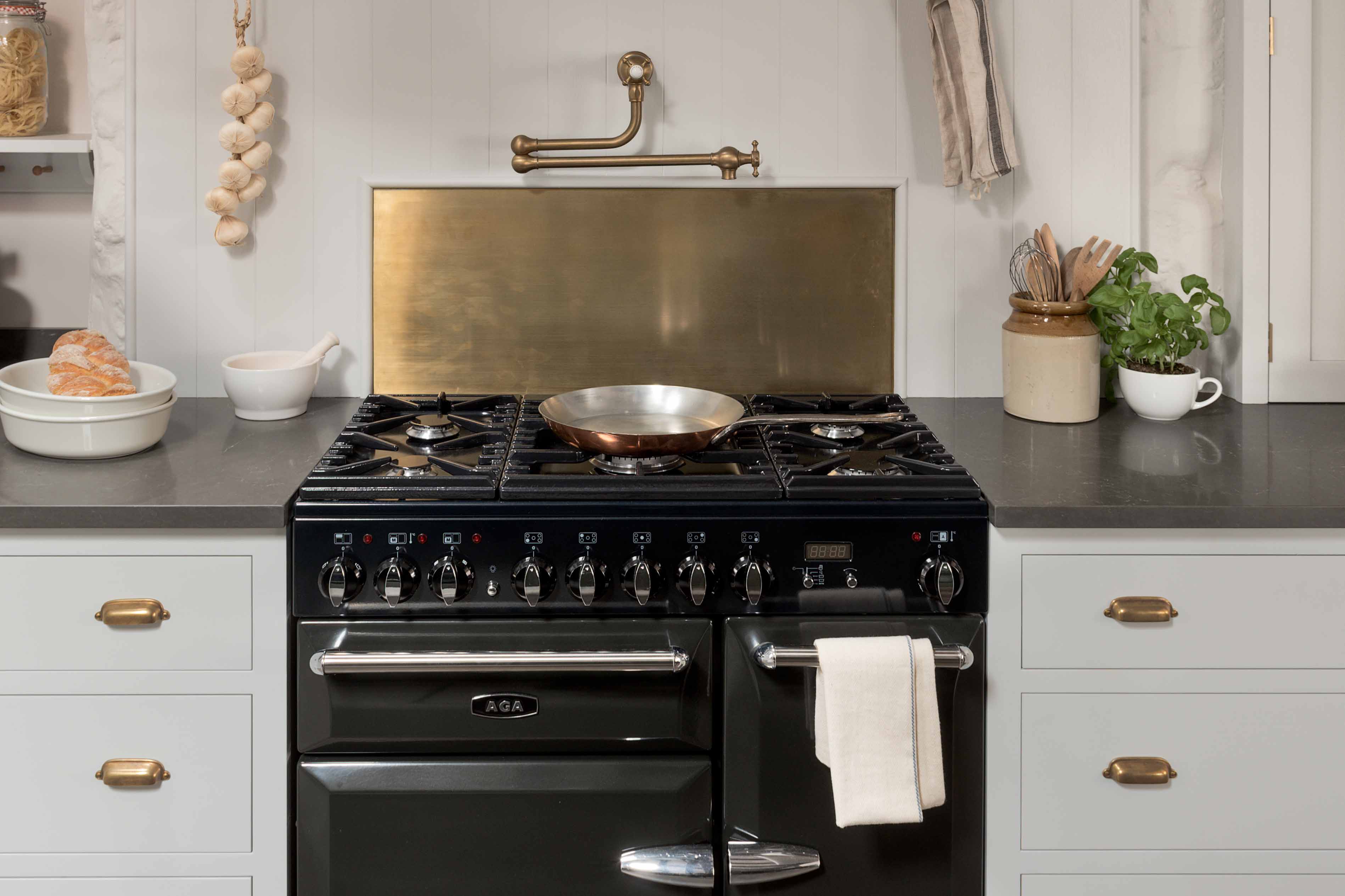 003. Bespoke kitchen shaker style range cooker Aga Wolf traditional Perrin and Rowe pot filler brass splash back Armac Martin Farrow and Ball near Weybridge, Surrey