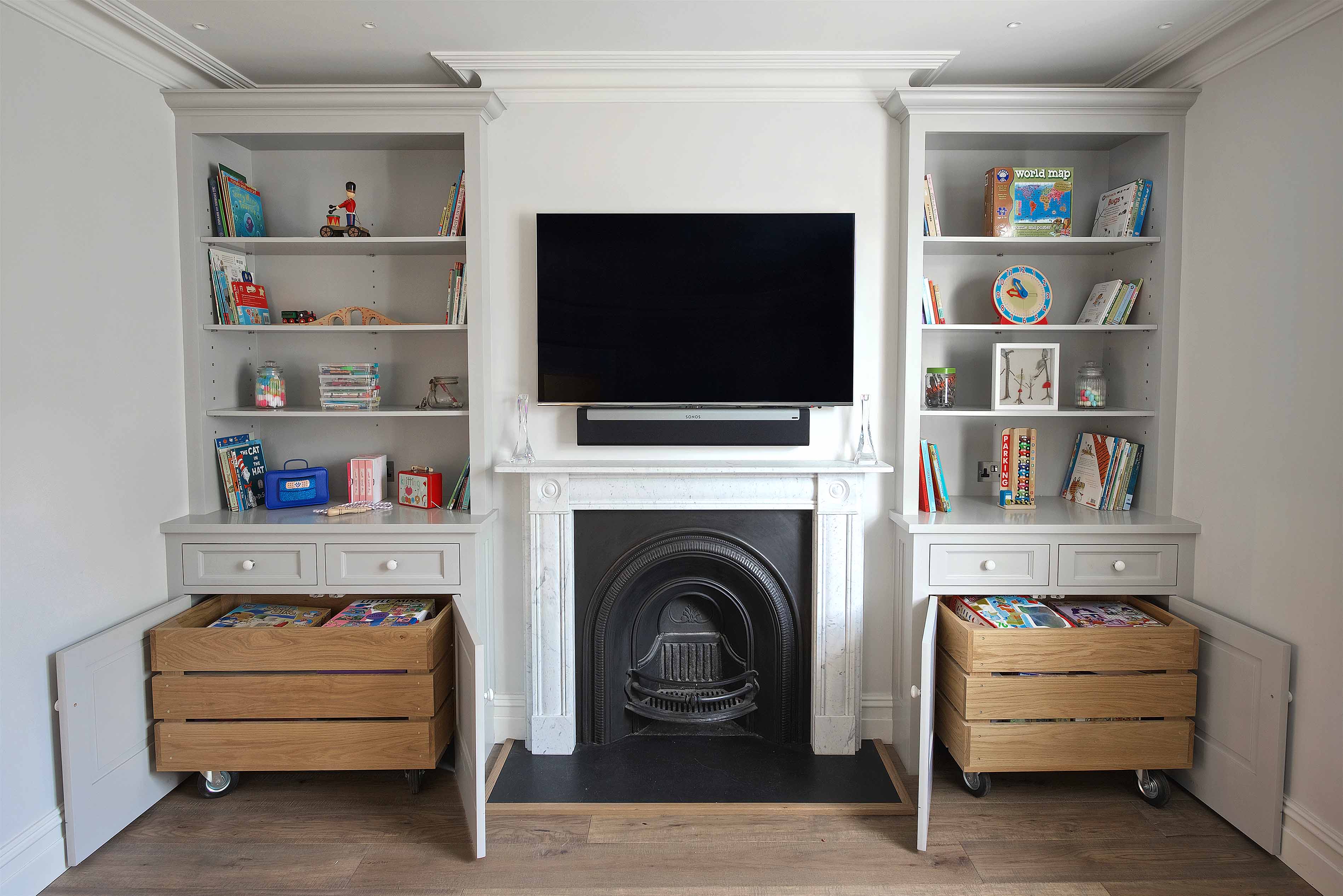 003. Bespoke fitted childrens play room kids pink Mylands Farrow and Ball armac Martin near Hindhead, Hampshire