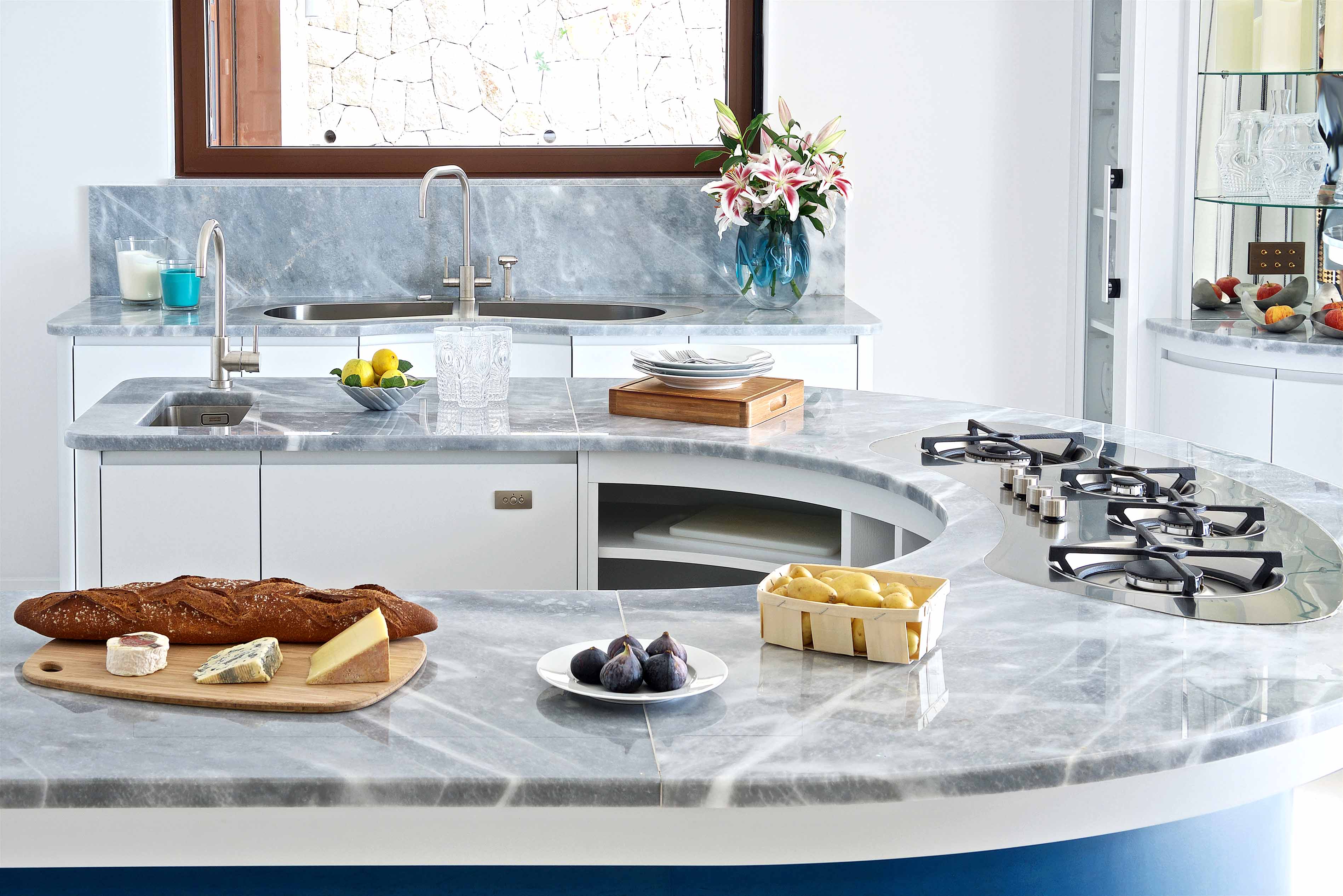 006. Contemporary bespoke kitchen brushed chrome steel nickel Miele Fisher Paykel Gaggenau Wolf Sub Zero Quooker curves sink hob Barazza near Hindhead, Hampshire