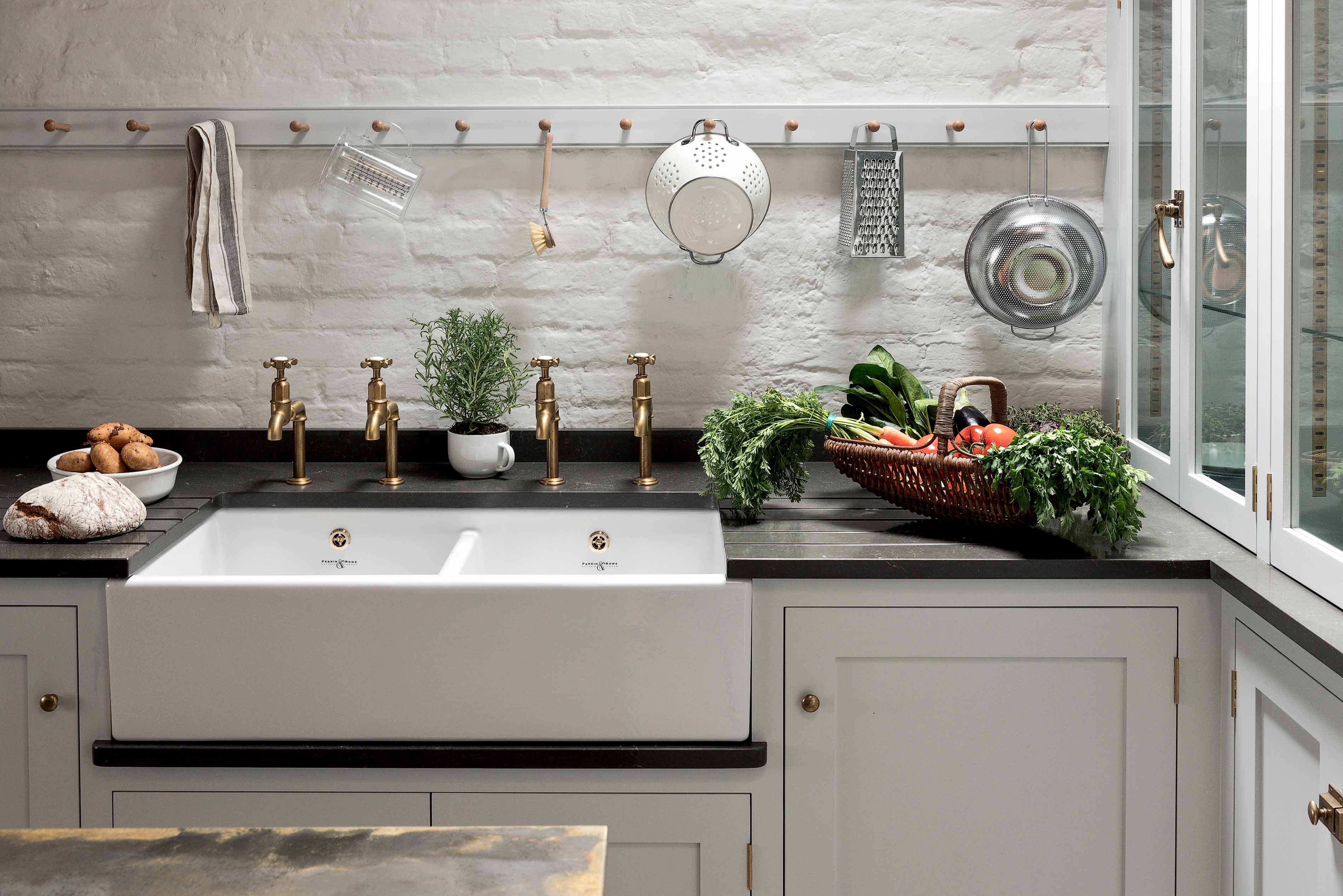 006. Bespoke pantry larder shaker style Farrow and Ball Mylands copper brass vegetable crates Perrin and Rowe Armac Martin near Guildford Surrey